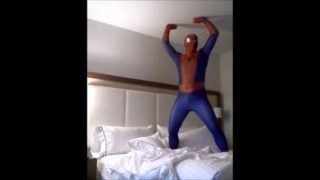 Spiderman on hotel bed