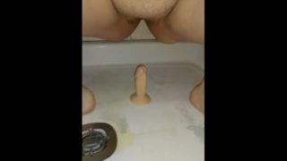 Full bladder release on dildo