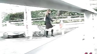 Japanese street sharking of a sexy woman in a skirt