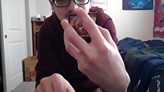 Cute Nerd Opening a Pack of Magic The Gathering Cards