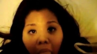 Asian slut sucks and receives cum on her face