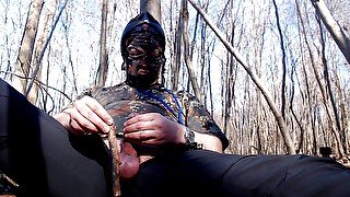 Handjob in the woods with camouflage uniform