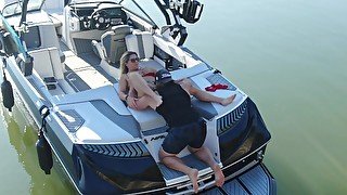 MILF getting her pussy licked on a boat in the middle of the lake