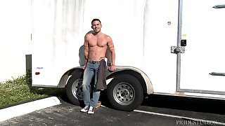 Muscle men meet up at a truck station and have hardcore gay sex