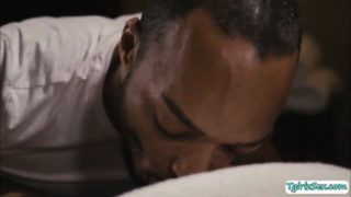 Black masseur throated and analed his busty shemale customer