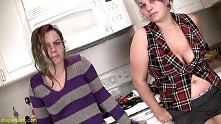 Chubby lesbian cowgirl pissing in the kitchen after getting her pussy fingered