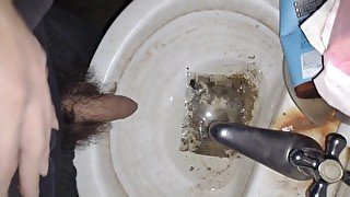 Hairy cock man pissing in old dirty sink