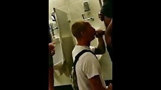 People come and go as a college guy sucks black cock.