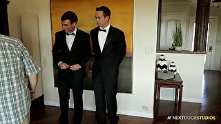 Two dudes dressed in tuxedos can't wait to come home and get naked