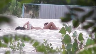 Voyeur tapes 2 nudist couples having sex at the beach