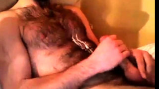 Hairy chest covered in cum