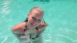 Wet blonde hottie working boobs in the pool