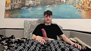 Cute twink jerking off a fat cock