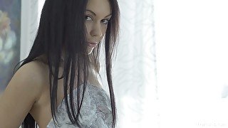 Sensual 19 yo brunette Nora is playing with yummy pussy early in the morning