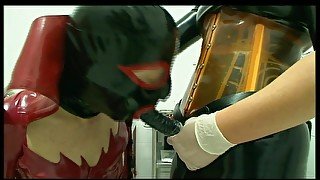 Humiliating pussy distress dildo sucking in masked, dominantrice in red latex dress