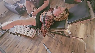 Blonde Teen restrained on medical chair