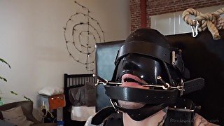 BDSM video of a tied dude that loves being all locked up