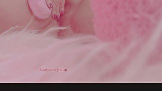 Cute socks and pussy play in a soft pink setting!