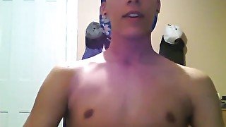 Mixed race cutie jerks his dick and foot teases