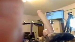 Huge dildo fucks her amateur cunt on webcam as she rides a bike