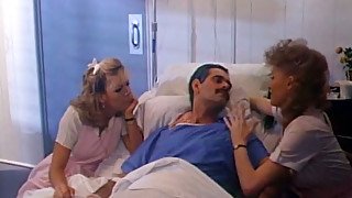 Dirty-minded classic nurses provides their patient with a handjob