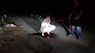 Leashed submissive wife pee on the road