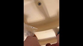 SUBMISSIVE GUY DESPERATELY PEE IN THE TUB AND MOANS IN RELIEF