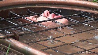 Busty model Rain DeGrey tied up in outdoors and tortured. HD