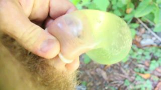 Hairy Guy Pees in a Condom, and makes a mess