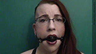 Sexy Brown-eyed Redhead Drooling Around her BallGag