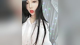 Beautiful Asian Babe Playing On Camera