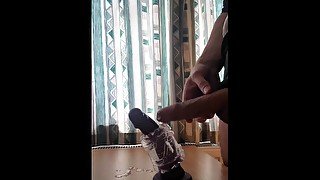 Horny guys cock frotts a dildo in his fleshlight. Sucking his own cum off dick