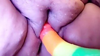 Rainbow dildo with creamy pussy