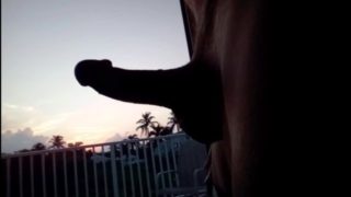 Stroking my cock with beautiful sunrise