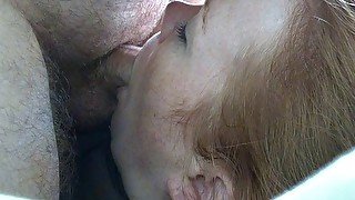 Redhead takes a facefucking and swallows