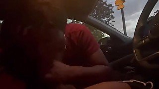 Ebony giving head in the car