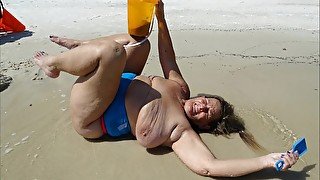 Beach Boob Sand Castle (includes 97 photo musical slide show)