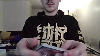 Nerd Opening a Pack of Trading Cards