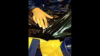 Solo masturbation in PVC raincoat and latex