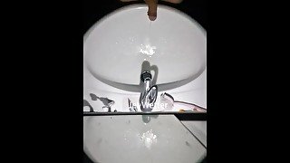 Messy pissing into the sink