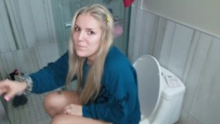 Young cute girl pisses long and hard in toilet 