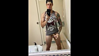 Young guy jerk off in front of the mirror