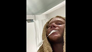 A handsome guy brushes his teeth and spits, wishing that instead of a brush he had a cock in his han