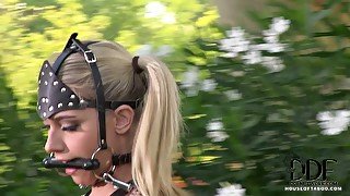 Mesmerizing blond babe gets fully bandaged with leather belts