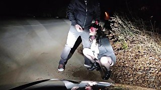 Piss Whore in dog collar receives golden shower and hot cum in her mouth in a public road interrupte