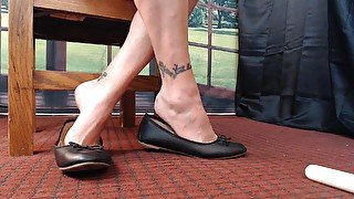 Close up ballet flats dangle play natural