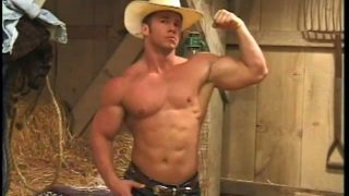 Gay cowboy with chiseled body poses and grabs his hard pecker