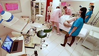 Anal examination by the apprentice and the mature head nurse