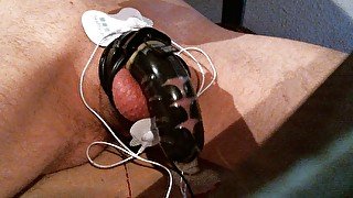 Cumming in chastity with E-stim