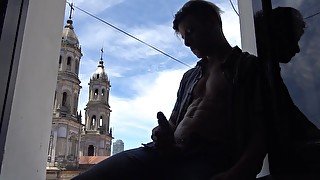 Hot guy touches himself and kinks next to a church, he cums all over himself